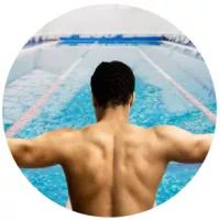 Man preparing to swim indoors