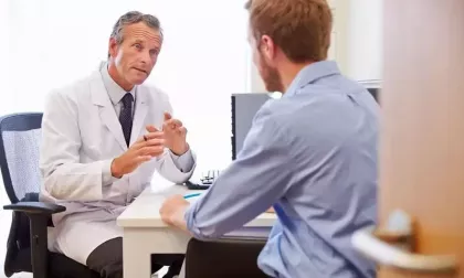 doctor speaking to patient