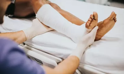 patient receiving care for leg fracture